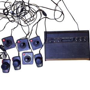 Atari 2600 UNTESTED Estate Find with 4 joysticks 2 paddles 1 driving